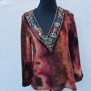 Celika? Celine? Cool woven v-neck long sleeve top, great decoration @ neck